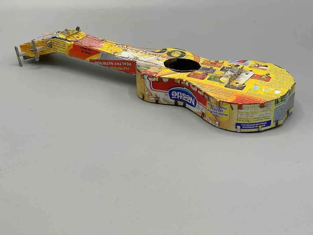 One of a Kind African Recycled Metal Can Toy Guitar - Burkina Faso